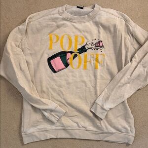 Cream Sweatshirt with Pop Off Graphic